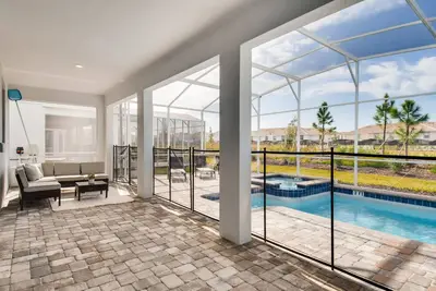 Image de Villa neuve de 6 chambres sur Champions Gate - jusqu'à 12 personnes - 12 km de Wdw