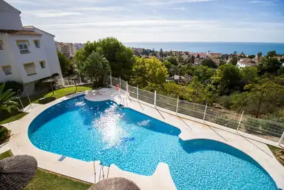 Image de Apt à Malaga avec 3 piscines, parking gratuit à 80m de la plage, internet 1000Mb