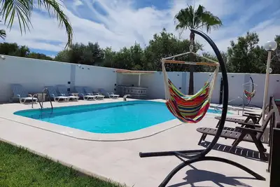 Image de Magnifique Villa De Luxe avec Piscine Climatique PRIVÉE près de la plage.