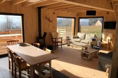 Image de Chalet neuf, avec vue sur le château de Murol et massif du Sancy