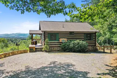 Image de Vues sur la montagne! Cabine de luxe romantique et confortable; Bain à remous, wifi, Tv satellite, à quelques minutes de Br