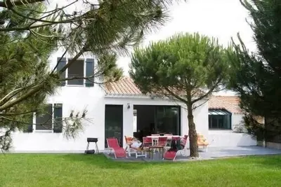 Image de Jolie et confortable maison de 2010, à 200m de la plage, 8 vélos et wifi gratuit