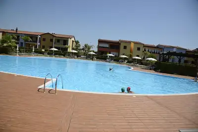 Image de Poseidone-Appartements raffinés dans un village avec piscine