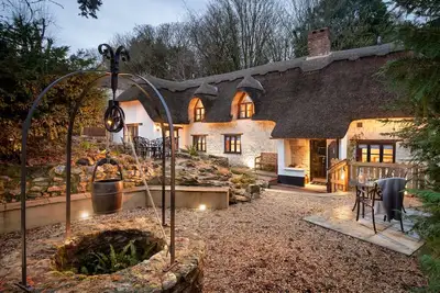 Image de Smithycroft est une belle maison individuelle en chaume et pierre.