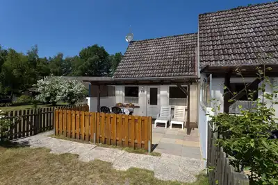 Image de complexe de maisons de vacances adapté aux enfants et aux chiens