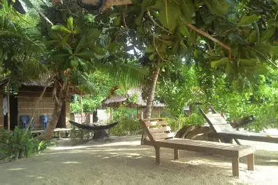 Image de Notre Bungalow est situé en face plage de sable blanc intégré Avec The Jungle