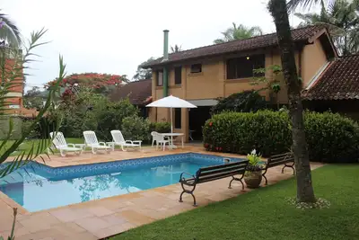 Image de Ubatuba House, 4 chambres (2 suites), climatisation et piscine, Lazaro, Jd. Pierre verte