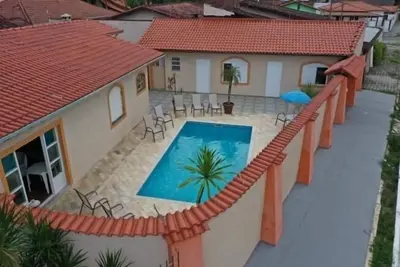 Image de Maison à Praia Grande High Standard avec piscine à 100 mètres de la plage
