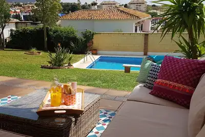 Image de Maison de ville dans un emplacement central avec une belle vue, parfaite pour les familles et les golfeurs