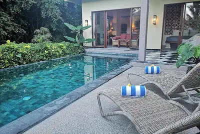 Image de Superbe villa une chambre chick avec piscine privée