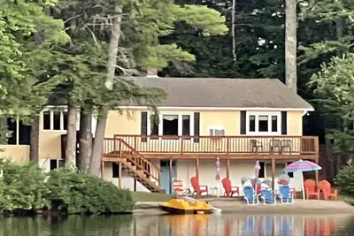Image de Maison au bord de l'eau avec plage de sable privée et grand quai en U.
