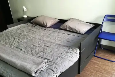 Image de Chambre impeccable avec salle de bain et accès privé, à 5 min de la plage