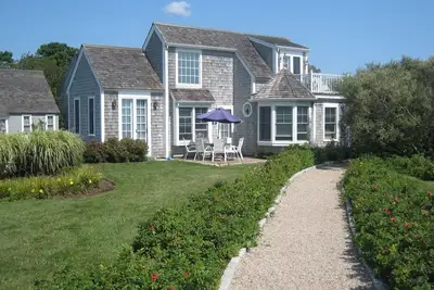 Image de Spectaculaire Maushop Cottage front de mer