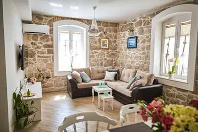 Image de Appartement Vintage avec patio extérieur et barbecue