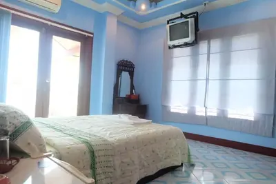 Chambre 5, parfaite pour les couples pour une escapade confortable.