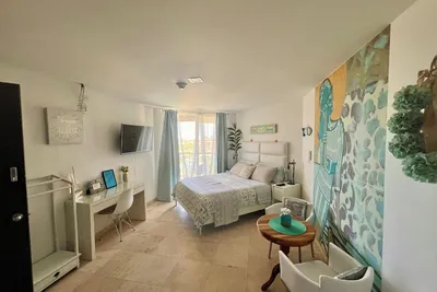 Image de Beau nouveau studio dans un condo de luxe (oasis), Eagle View et Wi-fi gratuit