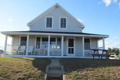 Image de Rénové Accueil front de mer sur la plage de Moody avec Guest Cottage