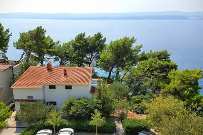 Image de Maison de plage en bord de mer pour les familles pour 4-5 personnes à Medići, Omiš, Split Riviera