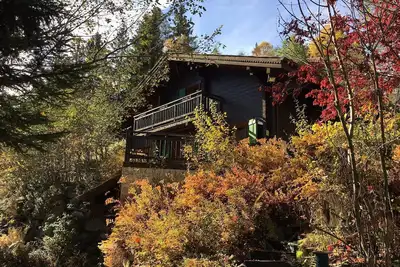 Image de Luxueux chalet orienté sud avec sauna et bain à remous extérieur
