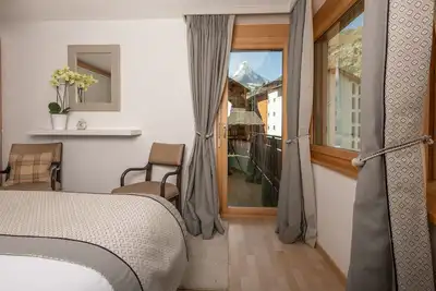 Image de Chez Nous Zermatt - 4 appartements de luxe dans le même immeuble avec vue sur le Cervin