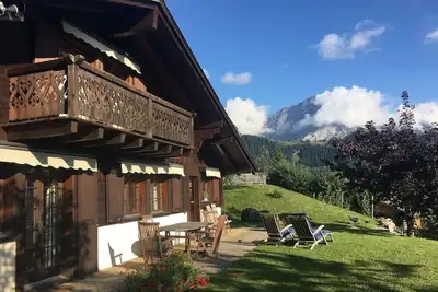 Image de Luxueux ski in \/ ski out chalet de montagne suisse classique avec des vues exceptionnelles