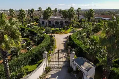 Image de Raffiné Résidence historique au cœur du Salento avec un grand jardin « Villa Romina »