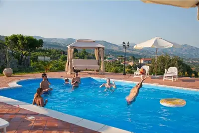 Image de Jusqu'Ă 16 personnes - piscine-jardin - barbecue -wi-fi - 3 km mer par \"SunTripSicily\"