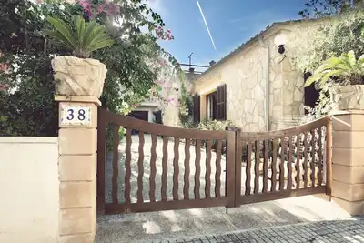 Image de Duplex pierre avec jardin et de la climatisation