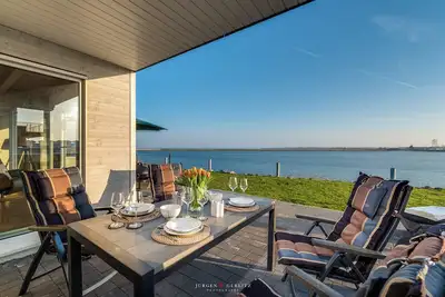 Image de Maison de vacances avec vue sur la mer directement Ă Schlei \/ Mer Baltique - terrasse, balcon, sauna