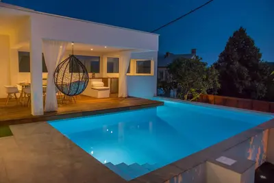 Image de Maison avec piscine, wifii