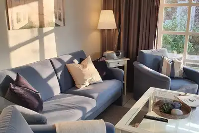 Image de Maison Ilka - moitié confortable d'une maison de vacances dans un emplacement idéal avec jardin et terrasse sur Harle