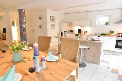 Image de Stadtloft a 110m² et est situé au coeur de Flensburg