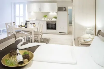 Penthouse avec terrasse sur le toit, lave-linge, sèche-linge, parking, WiFi,