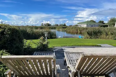 Image de Fh avec belle vue IJsselmeer et eig. Mise à l'eau \/ sauna