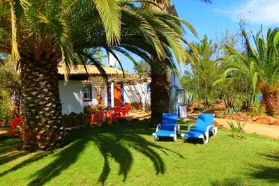 Image de Casa Palmeira est situé dans une oasis de verdure, piscine communautaire, plage à environ 7 km,