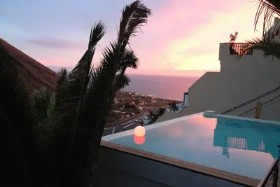 Image de lovingly furnished holiday home with pool and sea view
