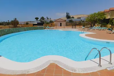 Image de Duplex dans un complexe avec piscine communautaire