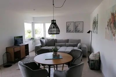 Image de Appartement meublé moderne près de la plage, garage et WiFi