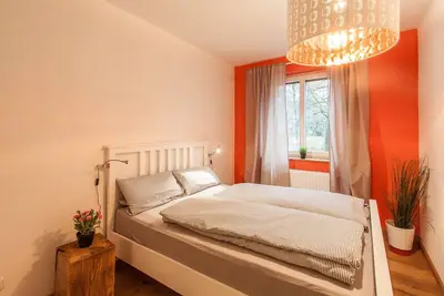 Image de Vivre au Ringpark - appartement moderne sur les rives du Main avec vue sur la forteresse // Käppele