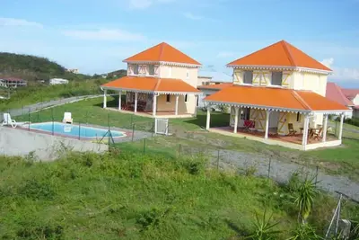 Image de Les ALIZÉS - locations vacances - Maisons Créoles avec Jardin et piscine