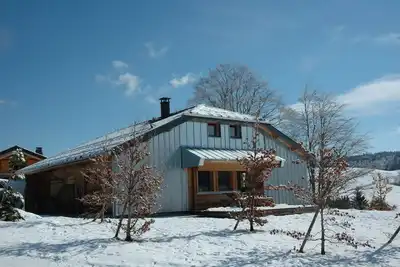 Image de Chalet moderne avec beaucoup de caractère, ambiance confortable et chaleureuse