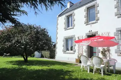 Image de Maison bord de mer avec jardin
