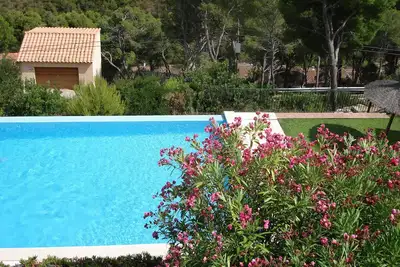 Image de House in a residence with swimming pool 800m from Sa Tuna beach