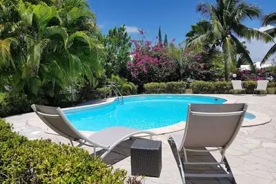 Image de Gîte gwada mango T2 climatisé à 150m de la plage, piscine, jardinet