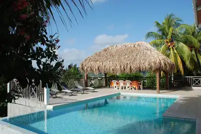 Image de Appartement 76m2, vue mer et forêt, piscine et grand jardin