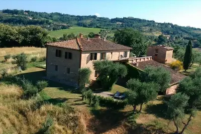Ferme toscane traditionnelle avec une vue imprenable