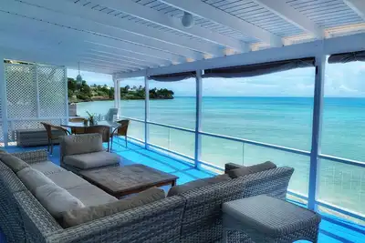 Image de La maison d'un surfeur loin de chez soi! Doux sur les bords, confortable et beachy