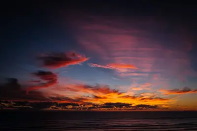 Image de Tasman Seascape - vues ininterrompues, magnifiques couchers de soleil et accès direct à la plage