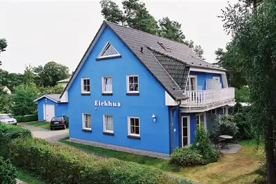 Image de Attrayant et décoré avec goût dans un appartement de style champêtre maritime