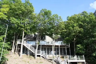 Image de Tranquillité - Maison 4 chambres au bord du lac dans un quartier calme - Mm 53 et 10 min. à Laurie